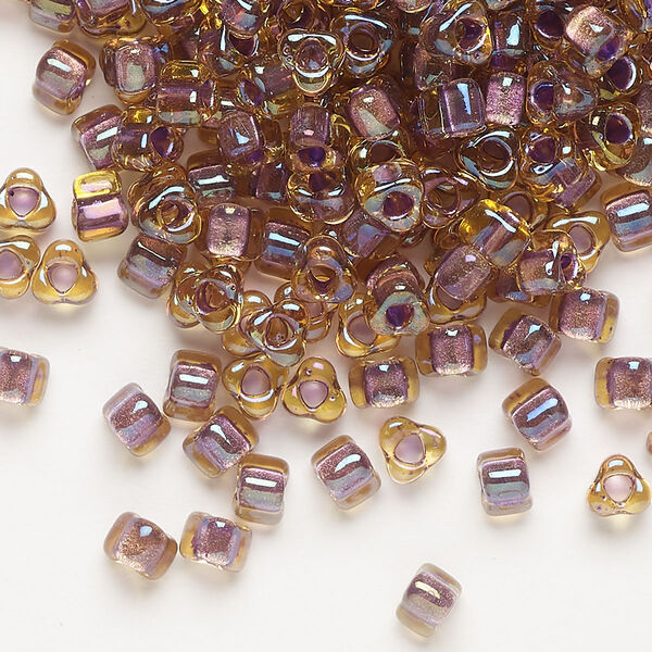 Seed bead, Miyuki, glass, transparent amber yellow color-lined lilac, (TR1167), #5 triangle. Sold per 25-gram pkg. image number 0