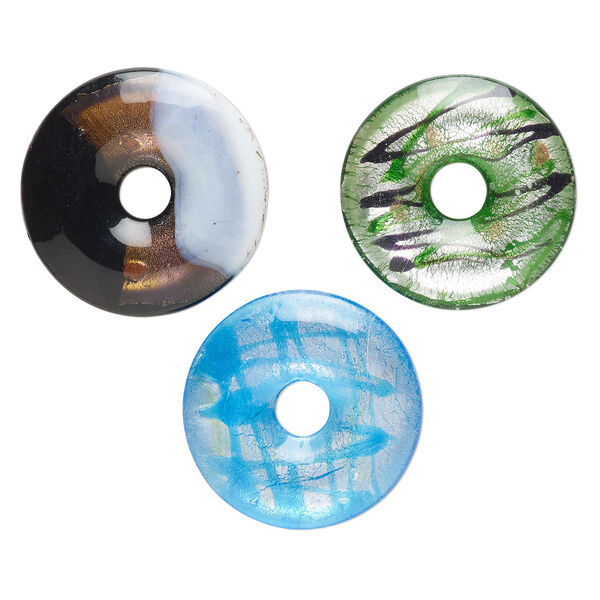 Random focal mix, lampworked glass, pkg/3, opaque to transparent mixed colors with silver-colored foil and copper-colored glitter, 40-45mm undrilled donut. image number 0
