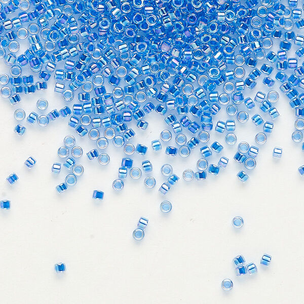 Seed bead, Delica®, glass, pkg/50g, #11 round, translucent blue-lined rainbow crystal clear (DB-0077). image number 0