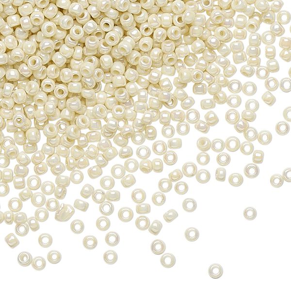 Seed bead, TOHO BEADS®, glass, pkg/7.5g, #11 round, opaque rainbow light beige (TR-11-409). image number 0