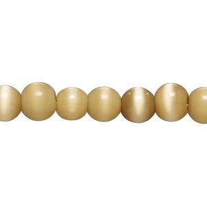 Bead, cat's eye glass (fiber optic glass), tan, 7-9mm round. Sold per 14-inch strand, approximately 55 beads.