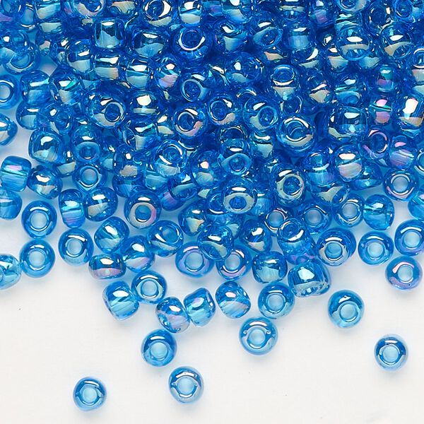 Seed bead, Dyna-Mites™, glass, transparent rainbow teal, #6 round. Sold per 1/2 kilogram pkg. image number 0