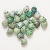 Bead mix, "howlite" (imitation) resin 1pkg25, opaque light to dark green, 17x14mm-18x15mm skull. image number 0