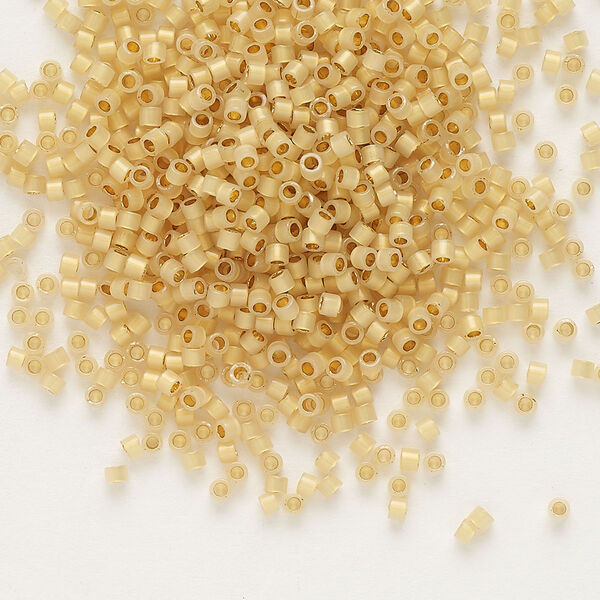 Seed bead, Delica®, glass, pkg/4g, #11 round, translucent 24Kt gold-lined opal (DB-0230). image number 0