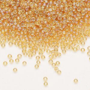 Seed bead, Miyuki, glass, pkg/25g, #11 rocaille, translucent rainbow light topaz (RR-251).