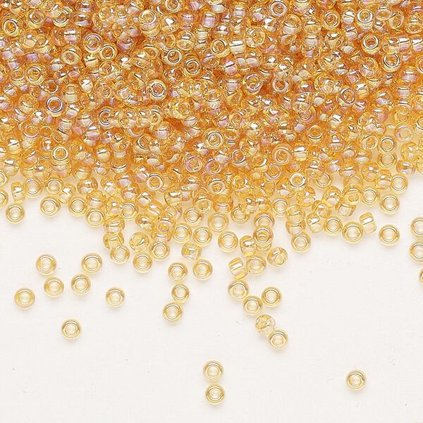 Seed bead, Miyuki, glass, pkg/25g, #11 rocaille, translucent rainbow light topaz (RR-251). image number 0