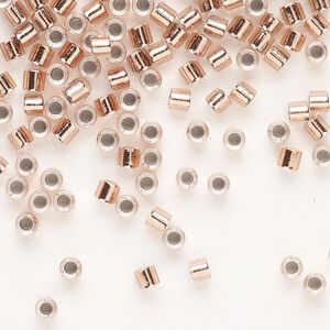 Seed bead, Delica®, glass, pkg/7.5g, #8 round, transparent copper-lined crystal clear (DBL-0037).