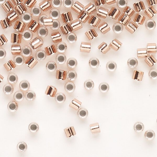 Seed bead, Delica®, glass, pkg/7.5g, #8 round, transparent copper-lined crystal clear (DBL-0037). image number 0