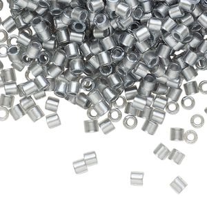 Seed bead, Delica®, glass, pkg/50g, #8 round, translucent silver grey-lined luster crystal clear (DBL-0271).
