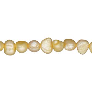 Pearl, cultured freshwater (dyed), buttercup, 5-6mm flat-sided potato, C- grade, Mohs hardness 2-1/2 to 4. Sold per 16-inch strand.