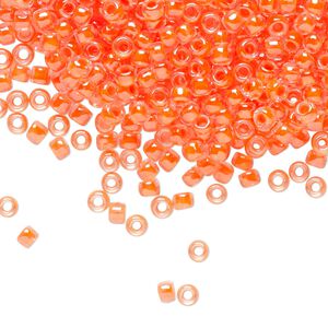 Seed bead, TOHO BEADS®, glass, pkg/7.5g, #8 round, translucent luminous inside color neon salmon (TR-08-803).