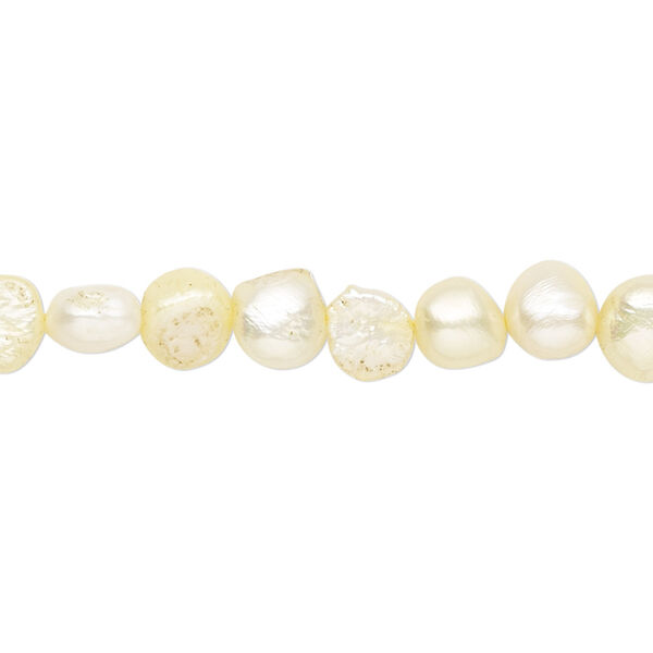 Pearl, cultured freshwater (dyed), daffodil, 5-6mm flat-sided potato with 0.4-0.6mm hole, D grade, Mohs hardness 2-1/2 to 4. Sold per 15-inch strand. image number 0