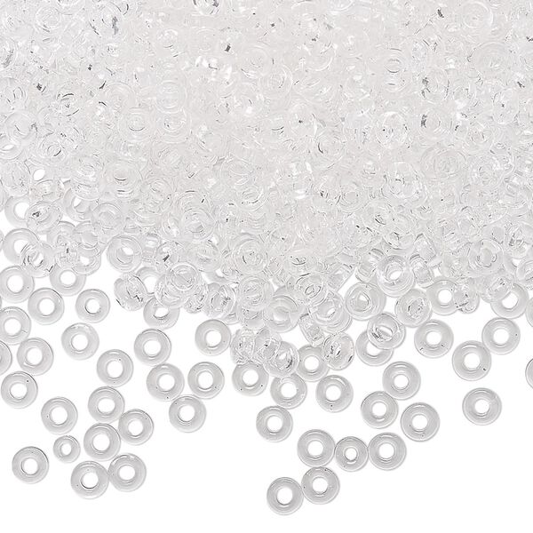 Seed bead, Miyuki, glass, pkg/10g, 3x1.3mm spacer rondelle, transparent clear, (SPR3-131). image number 0