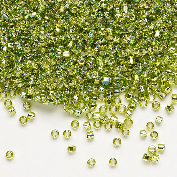 Seed bead, Dyna-Mites™, glass, pkg/1/2kg, #11 round, translucent silver-lined rainbow light green, (78R:SR 11/0 SR). image number 0
