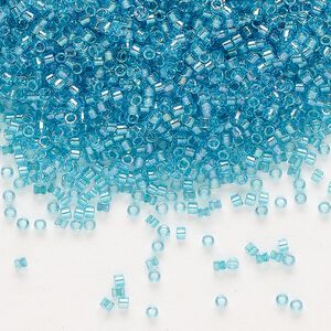 Seed bead, Delica®, glass, pkg/7.5g, #11 round, translucent aqua-lined luster crystal clear (DB-2382).