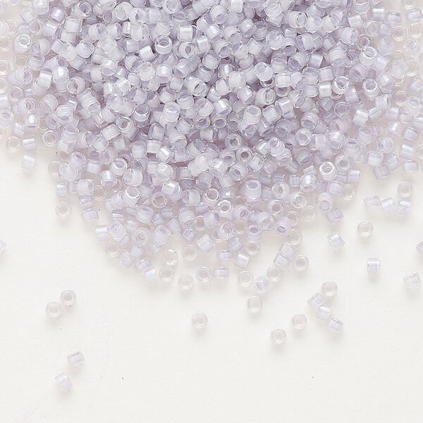 Seed bead, Delica®, glass, pkg/7.5g, #11 round, translucent pale violet-lined luster crystal clear (DB-0080). image number 0