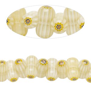 Bead, millefiori glass, translucent light tan and multicolored, 12x6-12x7mm peanut with sunburst and stripe design. Sold per 14-inch strand.