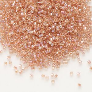 Seed bead, Delica®, glass, pkg/7.5g, #11 round, translucent peach-lined rainbow crystal clear (DB-0054).