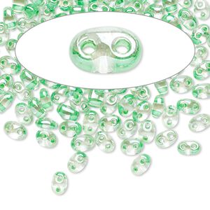 Seed bead, Preciosa Twin™ Czech glass, pkg/50g, 5x2.5mm oval, transparent light green terra color-lined clear, (38656).
