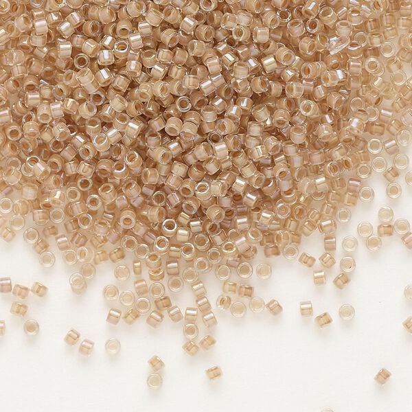 Seed bead, Delica®, glass, pkg/250g, #11 round, translucent blush-lined luster crystal clear (DB-0069). image number 0