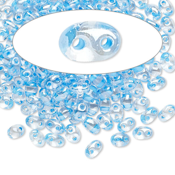 Seed bead, Preciosa Twin™ Czech glass, pkg/50g, 5x2.5mm oval, transparent sky blue terra color-lined clear, (38665). image number 0