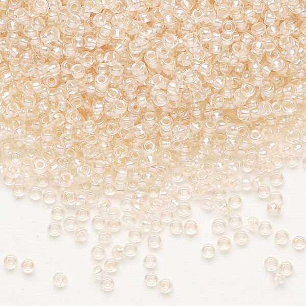 Seed bead, Preciosa Ornela, glass, translucent salmon pearl-lined crystal clear, #11 rocaille. Sold per 500-gram pkg. image number 0