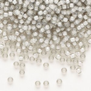 Seed bead, Miyuki, glass, pkg/50g, #8 rocaille, translucent moonstone-lined luster crystal clear (RR-2268).