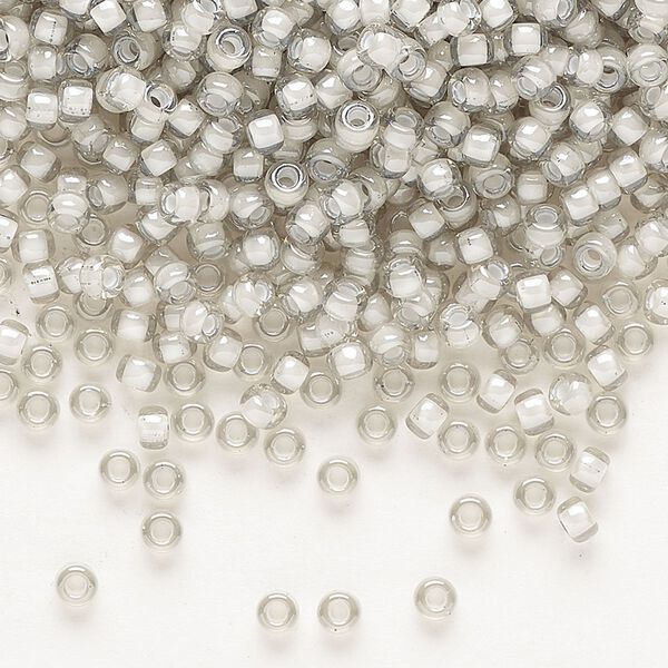 Seed bead, Miyuki, glass, pkg/50g, #8 rocaille, translucent moonstone-lined luster crystal clear (RR-2268). image number 0
