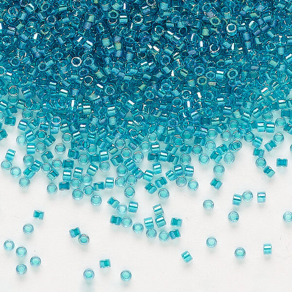 Seed bead, Delica®, glass, pkg/50g, #11 round, translucent teal-lined luster crystal clear (DB-2380). image number 0