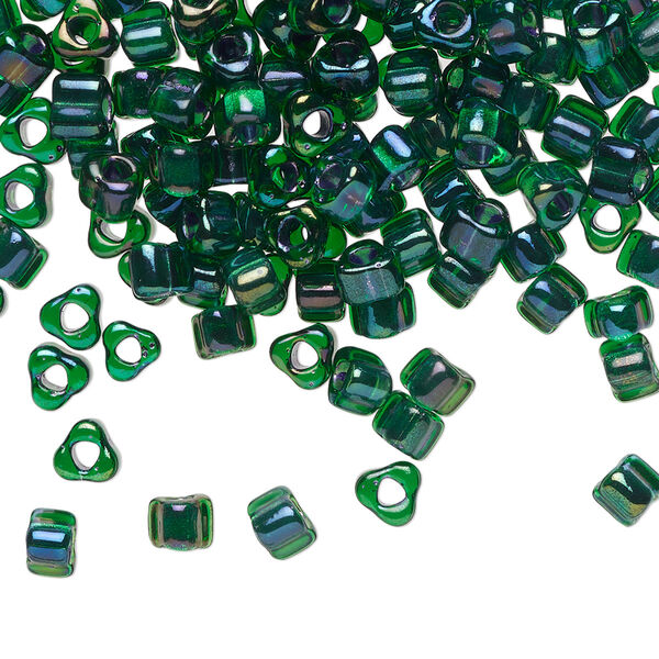 Seed bead, Miyuki, glass, transparent green color-lined metallic blue, (TR1812), #5 triangle. Sold per 250-gram pkg. image number 0