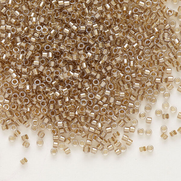 Seed bead, Delica®, glass, pkg/50g, #11 round, translucent beige-lined luster crystal clear (DB-0907). image number 0