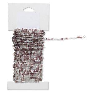 Beaded wire, glass and brass, transparent rainbow lavender and clear, #9 and #6 round seed beads. Sold per 15-foot card with hanging tab.