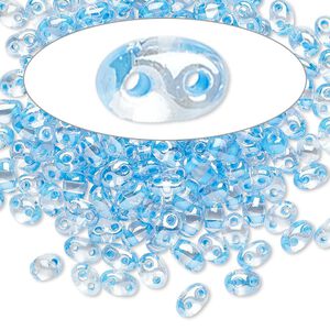 Seed bead, Preciosa Twin™ Czech glass, pkg/10g, 5x2.5mm oval, transparent sky blue terra color-lined clear, (38665).