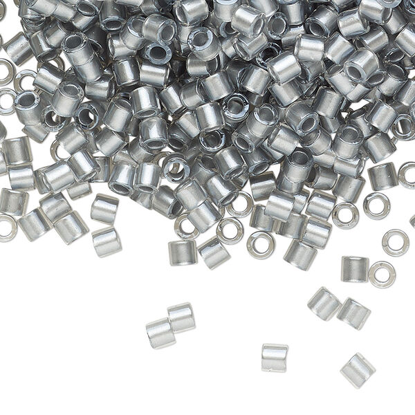 Seed bead, Delica®, glass, pkg/7.5g, #8 round, translucent silver grey-lined luster crystal clear (DBL-0271). image number 0