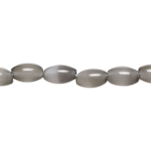 Bead, cat's eye glass (fiber optic glass), opaque black, 9x6mm oval, quality grade. Sold per 15-1/2" to 16" strand. image number 0