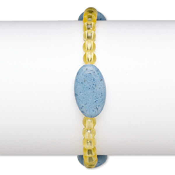 Bracelet, stretch, glass and acrylic, yellow and opaque blue, 5mm round and 23x13mm-23x14mm puffed oval, 7 inches. Sold individually. image number 0