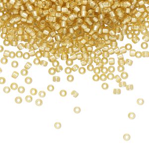 Seed bead, TOHO BEADS®, glass, pkg/7.5g, #11 round, translucent silver-lined frosted light topaz (TR-11-22F).