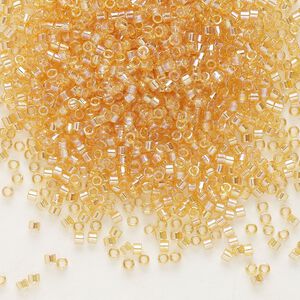 Seed bead, Delica®, glass, pkg/250g, #11 round, translucent rainbow light topaz (DB-0100).