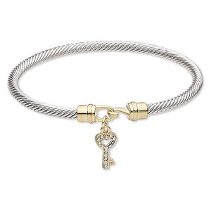 Bracelet, bangle, Czech glass rhinestone / gold-finished "pewter" (zinc-based alloy) / silver-plated brass, clear, 4mm twisted cable with 16x8mm key, 7-1/2 inches with hook-and-eye clasp. Sold individually.