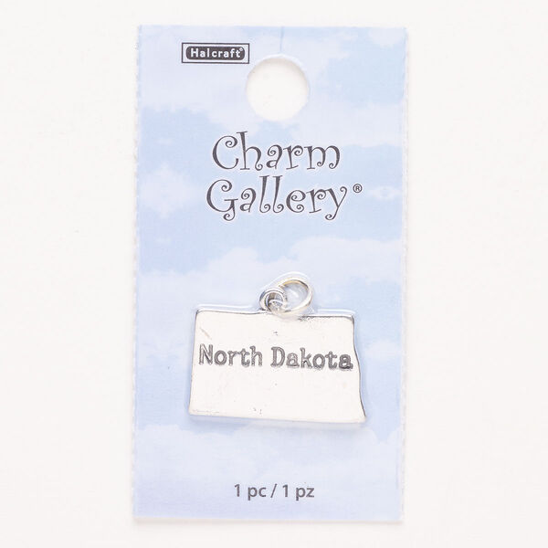 Charm, steel and enamel, pkg/1, silver finish and black, 23x14mm with "North Dakota." image number 0
