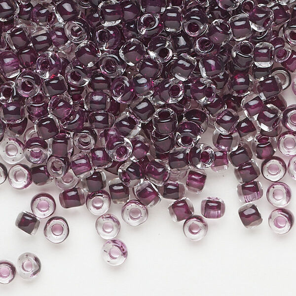 Seed bead, Dyna-Mites™, glass, translucent inside color dark mauve, #6 round. Sold per 40-gram pkg. image number 0