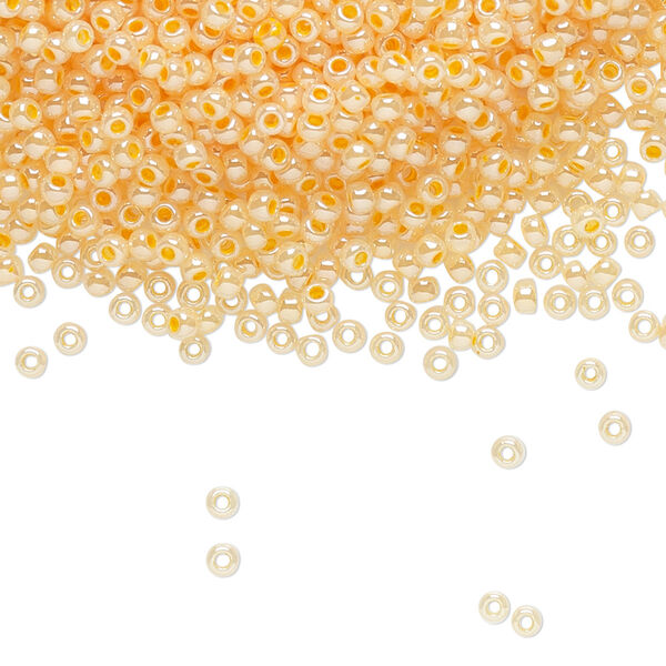Seed bead, TOHO BEADS®, glass, pkg/250g, #11 round, opaque ceylon apricot (TR-11-904). image number 0