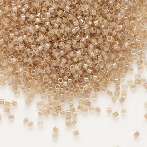 Seed bead, Delica®, glass, pkg/7.5g, #11 round, translucent blush-lined luster crystal clear (DB-0069).