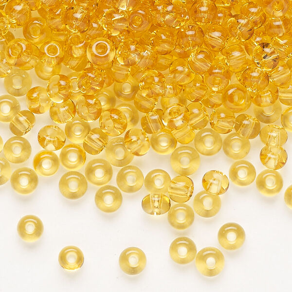 Seed bead, Preciosa Ornela Czech glass, pkg/500g, #6 rocaille, transparent light topaz, (10020). image number 0