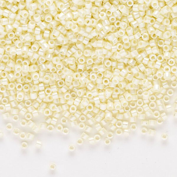 Seed bead, Delica®, glass, pkg/7.5g, #11 round, opaque glazed luster pale yellow (DB-1531-1). image number 0