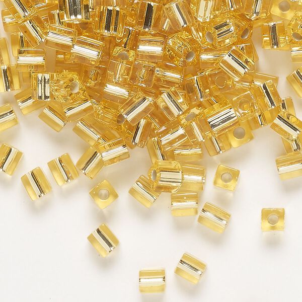 Seed bead, Miyuki, glass, pkg/25g, 3.5-3.7mm square, transparent silver-lined gold (SB-3). image number 0
