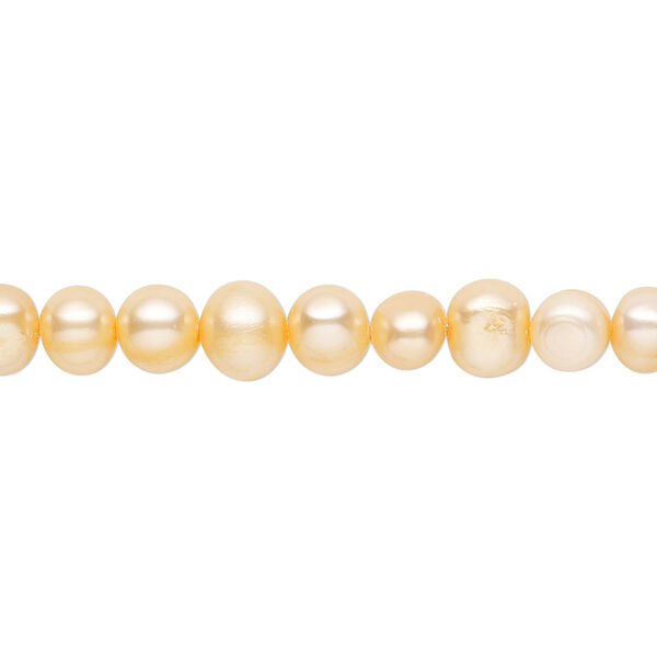 Pearl, cultured freshwater (dyed), peach, 5-6mm semi-round with 0.4-0.6mm hole, D grade, Mohs hardness 2-1/2 to 4. Sold per 14-inch strand. image number 0