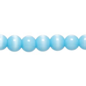Bead, cat's eye glass (fiber optic glass), sky blue, 7-9mm irregular round. Sold per 14-inch strand, approximately 50 beads.