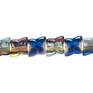 Bead, glass, translucent half-coated metallic blue and vitrail, 9mm flower. Sold per 15-1/2" to 16" strand.