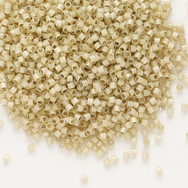 Seed bead, Delica®, glass, pkg/7.5g, #11 round, translucent silver-lined glass enamel light honey opal (DB-1458). image number 0